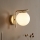 Brilagi - Nástěnná lampa MILO 1xE27/60W/230V zlatá