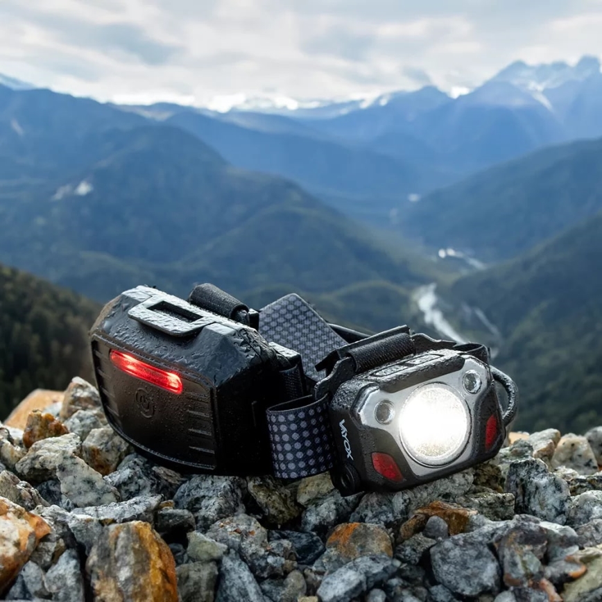 LED Stmívatelná nabíjecí čelovka se senzorem s funkcí powerbanky a červeným světlem LED/10W/5V IP44 1200 lm 4000 mAh