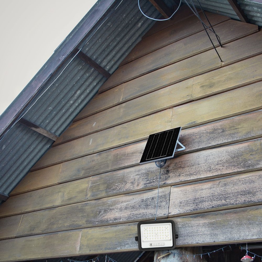 LED Stmívatelný solární reflektor LED/100W/3,2V 2000-8000K IP65 5000 mAh černá + dálkové ovládání