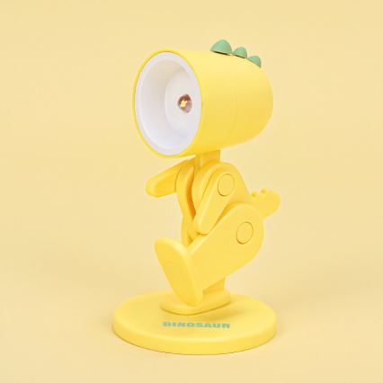 LED Stolní lampa LED/0,06W/3xLR41 dinosaurus žlutá