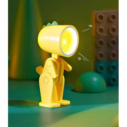 LED Stolní lampa LED/0,06W/3xLR41 dinosaurus žlutá