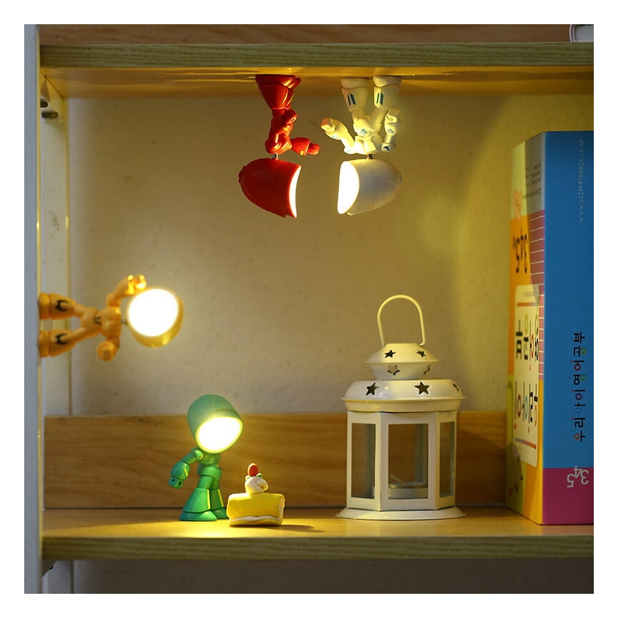 LED Stolní lampa LED/0,06W/3xLR41 robot žlutá