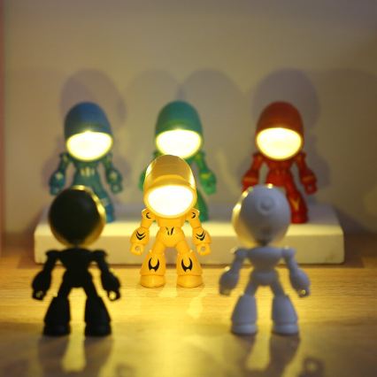 LED Stolní lampa LED/0,06W/3xLR41 robot žlutá