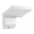LED Venkovní nástěnné svítidlo se senzorem pohybu LED/18W/230V IP44 bílá