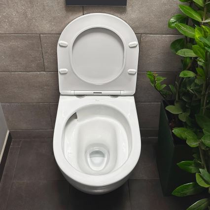 REA-C1259 - Závěsné WC s prkénkem CARLO MINI TORNADO RIMLESS keramika/lesklá bílá