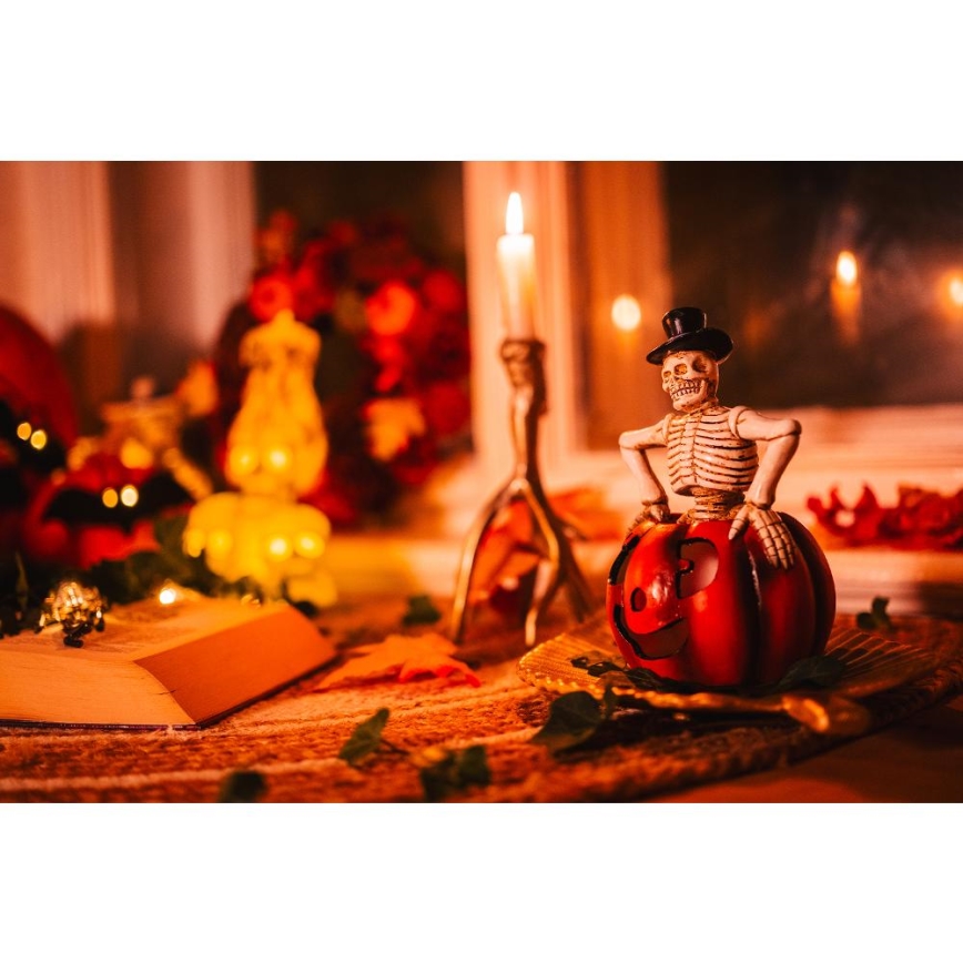 LED Dekorace HALLOWEEN LED/2xLR44/teplá bílá kostlivec v dýni pryskyřice